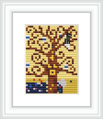 The image shows a framed cross stitch pattern depicting a stylized tree with geometric branches against a patterned background. The frame is white and square, accentuating the artwork within.