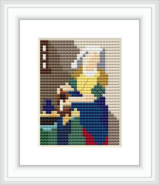 The image shows a cross stitch pattern framed in white. The design portrays a woman, likely in a domestic setting, focused on her task which appears to be pouring milk or engaging in kitchen work. The pattern is stitched with a variety of colors creating shading and depth.