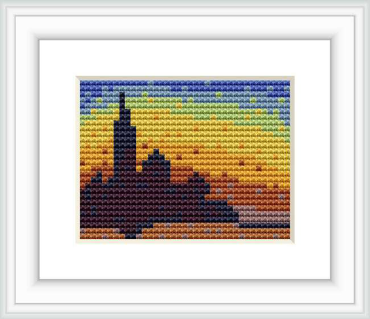 The cross stitch pattern depicts a simplified impressionist-style landscape with a silhouette of Venetian buildings against a gradated sunset sky reflected in the water.