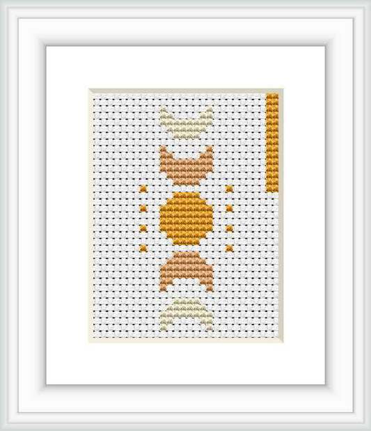 The image shows a framed cross stitch pattern featuring abstract interpretations of moons in various phases, arranged in a symmetric vertical layout. The background is white contributing to a clean presentation.