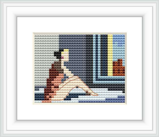 This cross stitch depicts a figure sitting by a window. The design is stylized with bold color blocks and gradations, inspired by the play of morning light.