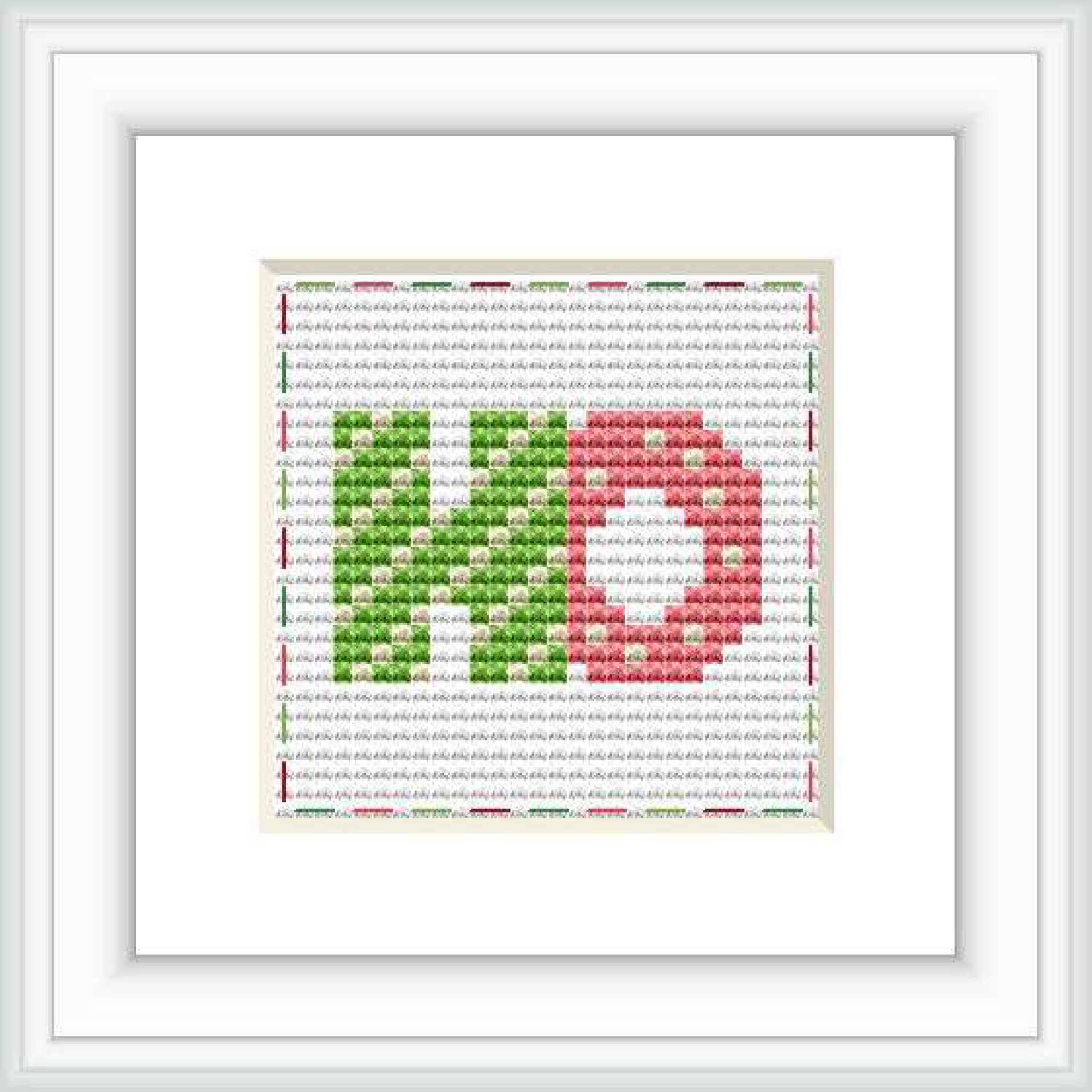 The image features a framed cross stitch pattern with the letters 'HO' centered on it. The letters are in a block style, with the 'H' in green and the 'O' in red, set against a background that fades from grey at the top to white at the bottom, with tiny red and green dots simulating a festive pattern.