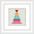 The image displays a framed cross stitch pattern depicting a Christmas tree with a pixelated, rainbow color gradient against a neutral patterned background.