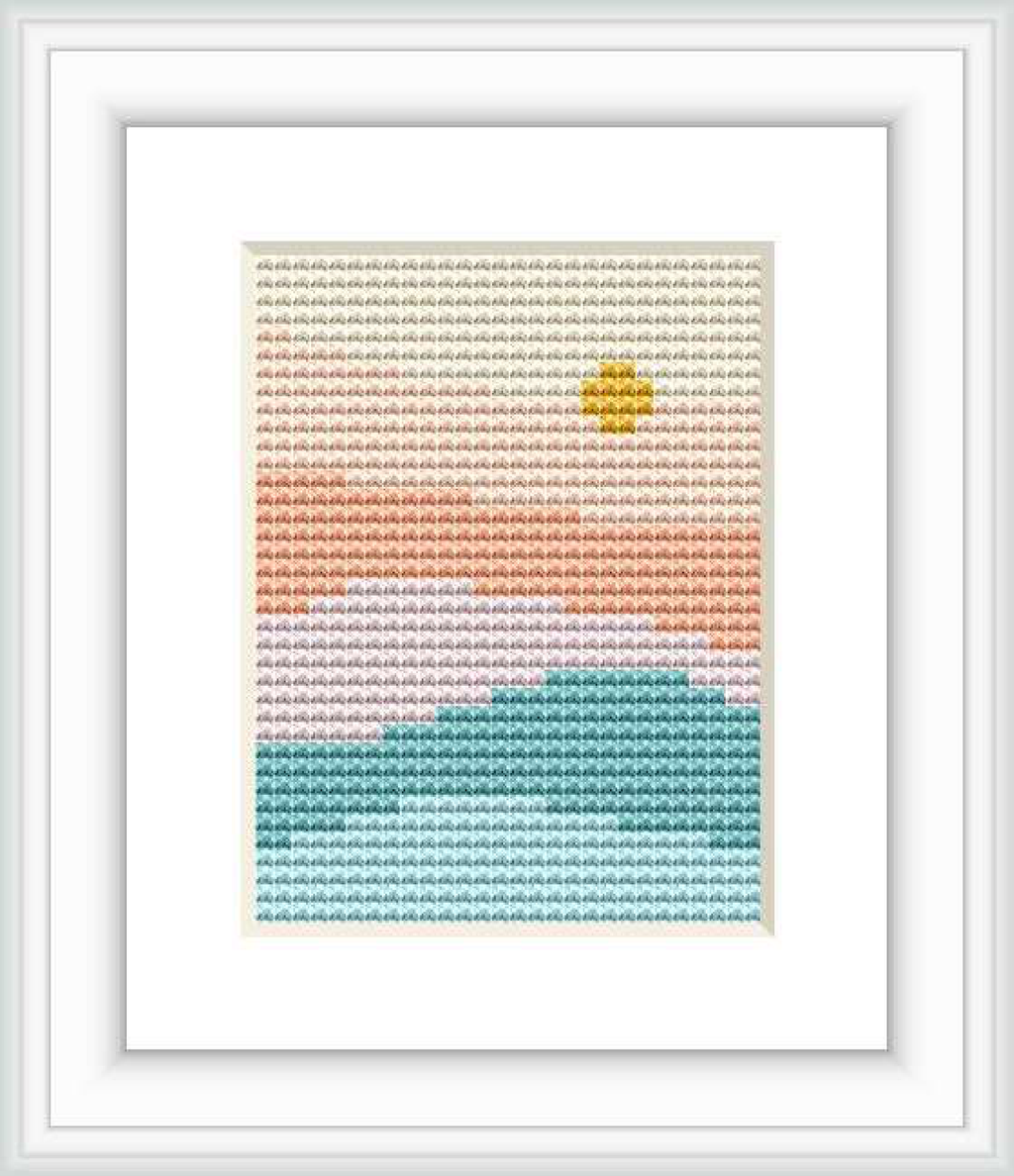 The image depicts a cross stitch pattern featuring a gradient of colors that resemble a sunrise over a landscape, starting with green at the bottom, ascending through shades of pink and orange, and topped with a small yellow dot as the sun.