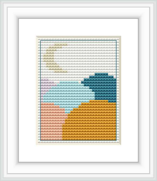 The cross stitch pattern depicts a minimalist landscape consisting of color-blocked sections simulating a rolling hill, sky, and setting sun in a frame.