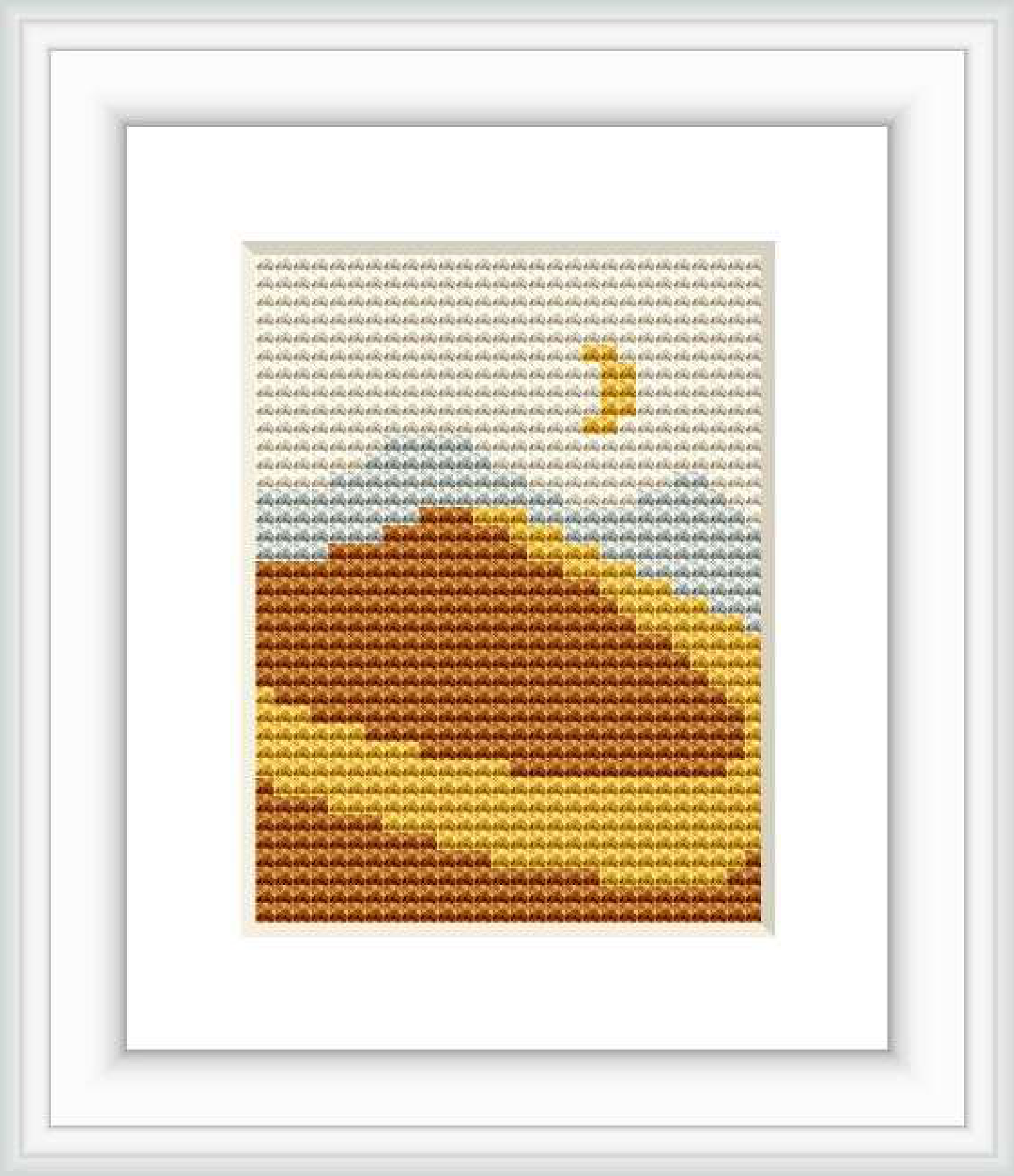 The image depicts a simplistic cross stitch pattern of a desert dune. The dune is depicted in golden and brown tones, set against a background that gradients from ivory to gray, with a small mustard-colored accent that could represent the sun.