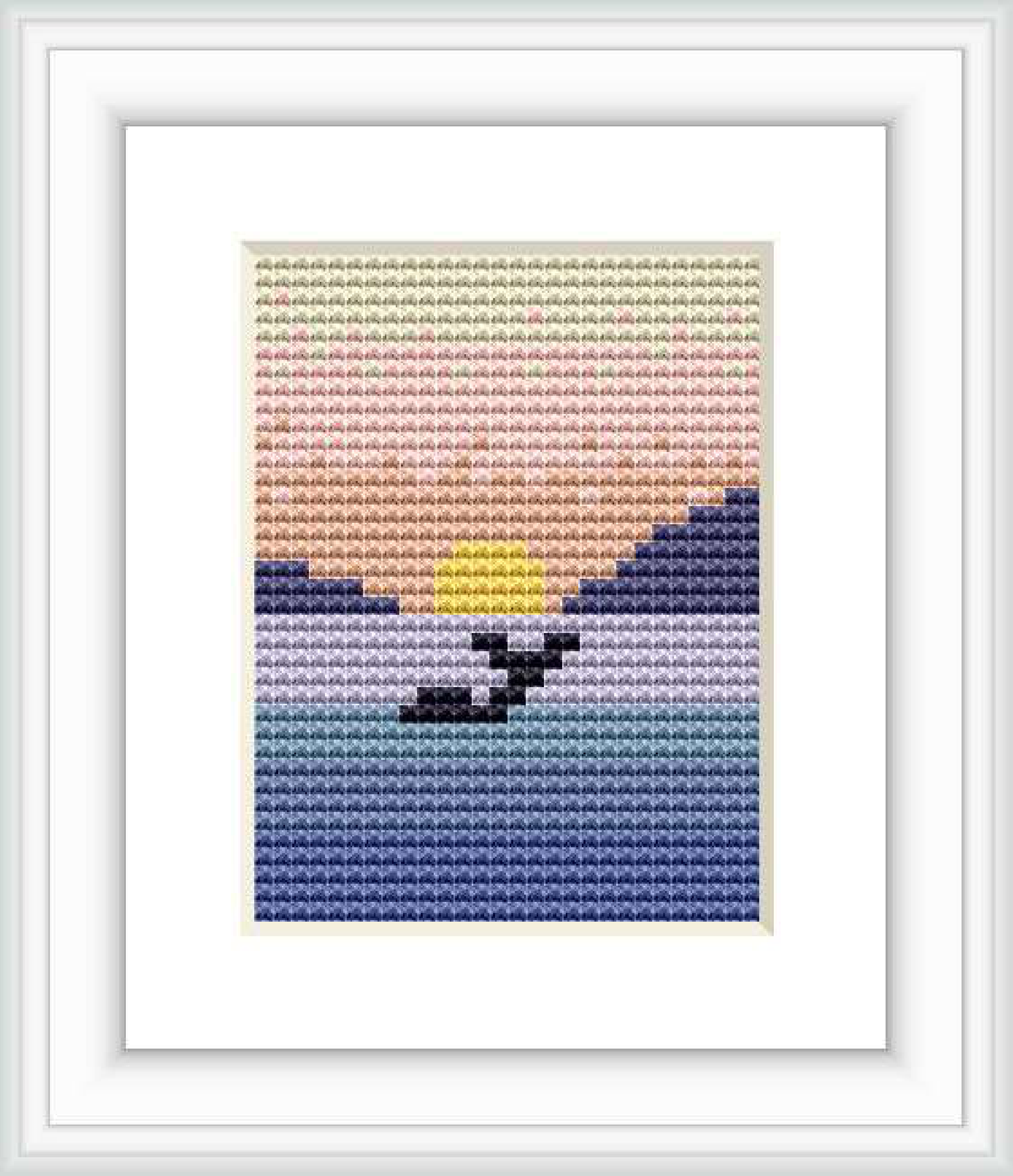 The image shows a cross stitch pattern depicting a mountain landscape with a setting sun. The mountains are rendered in shades of blue, with a pink to yellow gradient sky above, symbolizing a sunset.