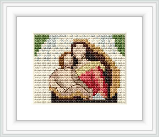 The image features a cross stitch pattern of Raphael's Sistine Madonna, framed and displayed with a white background. The focus is on Madonna holding the Child in a loving embrace, with a discreet color palette and pixel-like granularity.