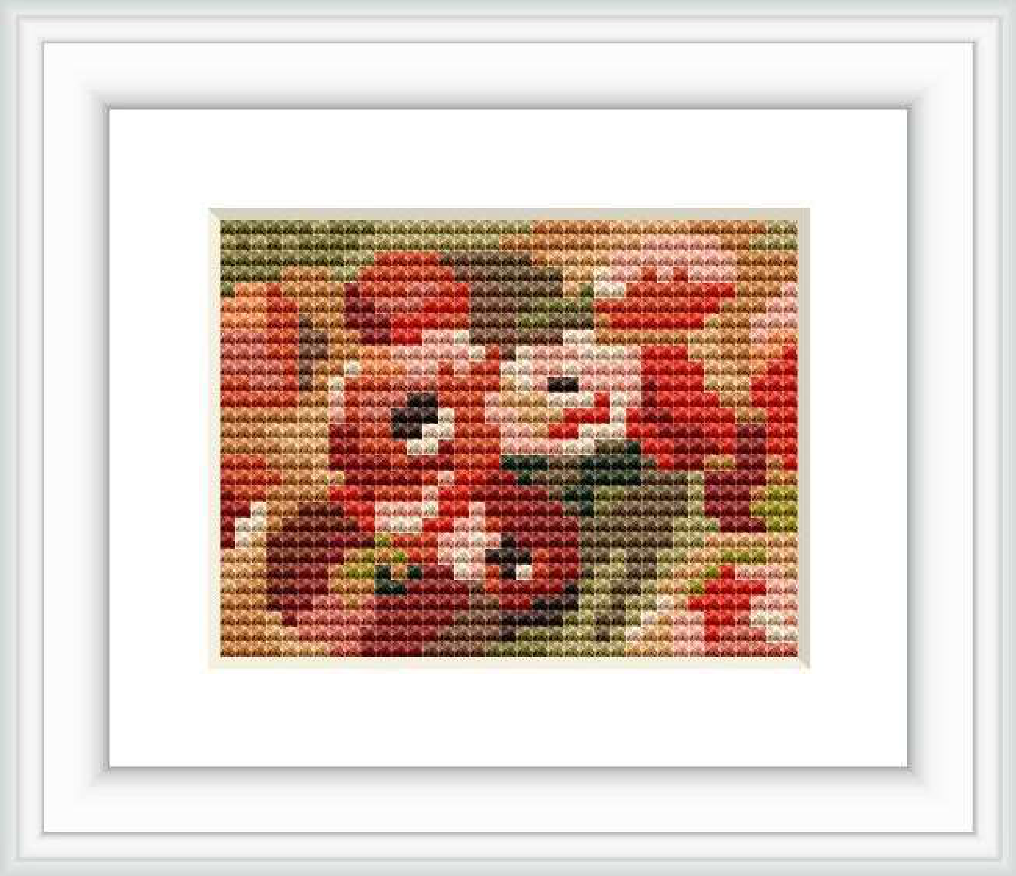 A cross stitch representation of Pierre-Auguste Renoir's artwork featuring anemones. The stitched piece captures the essence of the floral theme with a palette of reds, greens, and neutral tones.