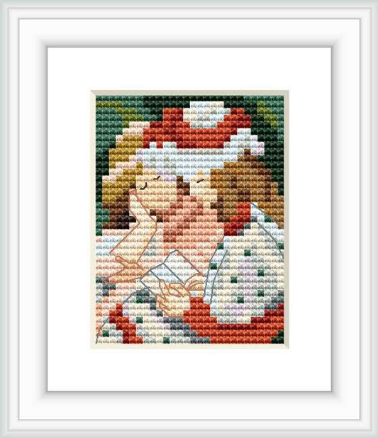 The image shows a cross stitch pattern depicting two girls reading a book together. The background consists of a collage of earthy and warm colors, giving an intimate and cozy atmosphere to the depiction.