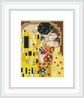 The cross stitch pattern depicts a stylized couple in an embrace, reminiscent of Klimt's 'The Kiss', with a golden, geometric backdrop and colorful embellishments.