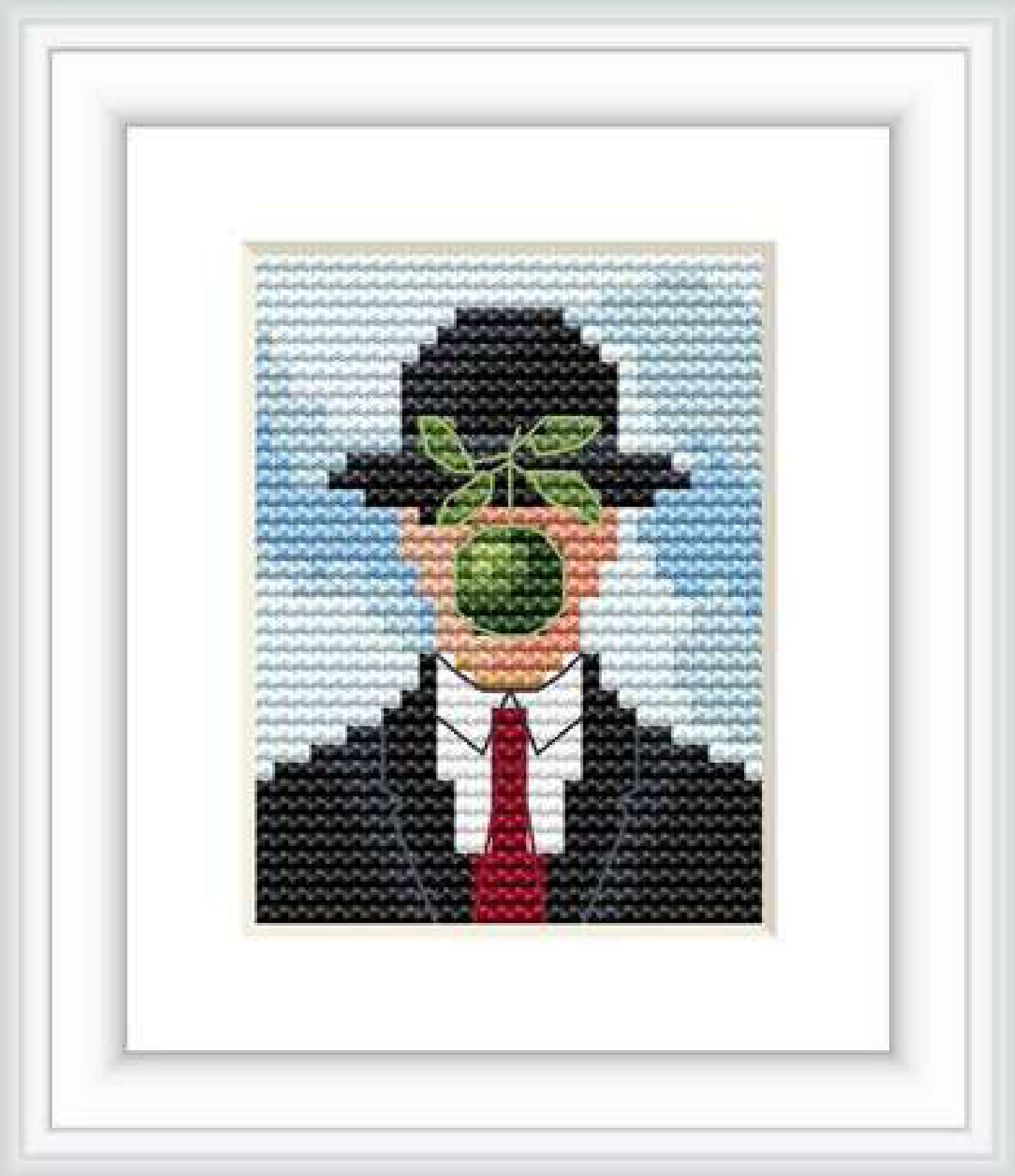 The design depicts a gentleman in a suit and bowler hat, facing forward with a green apple obscuring his face against a sky blue background with wispy white clouds.
