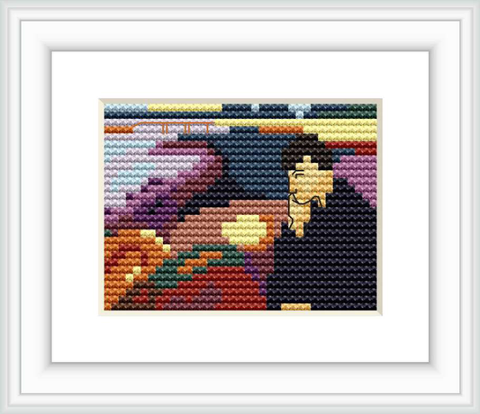 A framed cross stitch pattern depicting a portrait with abstract elements, set against a seascape backdrop.