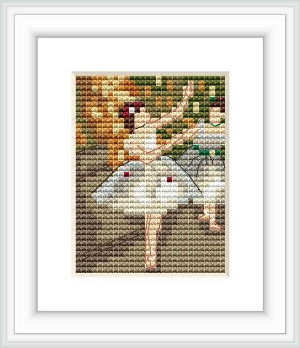 A framed cross stitch pattern depicting two ballet dancers on stage, possibly during a rehearsal or performance, with hints of a backdrop and an audience.