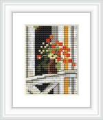 The image displays a framed cross stitch pattern featuring a still life scene with a vase of blooming poppies. The vase is placed on a surface with a contrasting dark background, surrounded by vertical stripes.