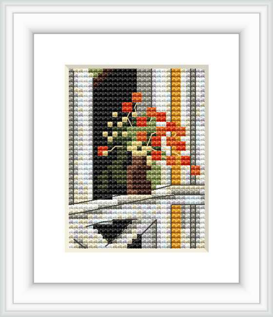 The image displays a framed cross stitch pattern featuring a still life scene with a vase of blooming poppies. The vase is placed on a surface with a contrasting dark background, surrounded by vertical stripes.