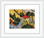 The cross stitch pattern depicts a valley with a ploughman and oxen, as seen from an elevated perspective. It includes elements like trees, fields, and a colorful umbrella.