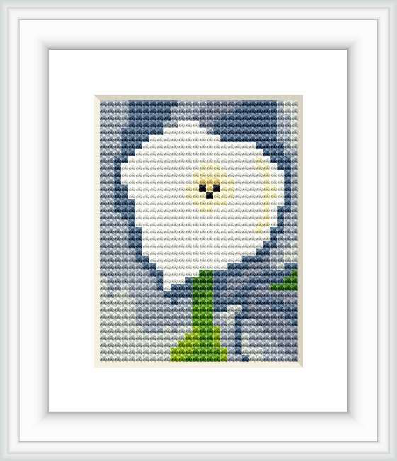 A cross stitch pattern depicting a single calla lily flower with a yellow center against a grey background, contained within a squared frame.