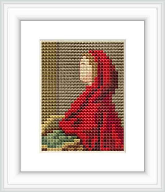 The image depicts a cross-stitch pattern of Red Riding Hood, a character in a fairytale. This particular representation references the work of Sir John Everett Millais. Positioned to the left, she is wrapped in a red hood and cloak, set against a neutral, dark background.