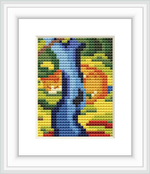 The image displays a cross stitch pattern of a stylized cat seated under the abstract form of a tree. The cat is predominantly blue, while the surrounding foliage features a vibrant assortment of colors, including green, yellow, orange, and red.