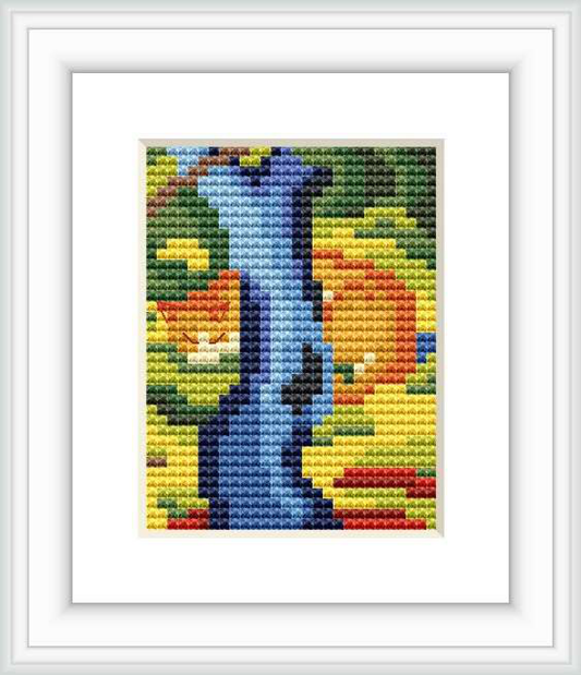 The image displays a cross stitch pattern of a stylized cat seated under the abstract form of a tree. The cat is predominantly blue, while the surrounding foliage features a vibrant assortment of colors, including green, yellow, orange, and red.