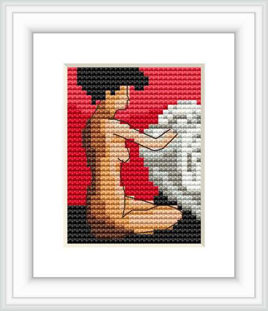 The image shows a cross-stitch pattern framed in white, showcasing a side profile of a human figure sitting against a gradated background moving from darker at the top to lighter at the bottom.