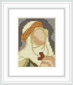 The image depicts a cross stitch pattern framed and displayed against a white background. The pattern shows a figure in contemplation, with earthy and muted color tones.