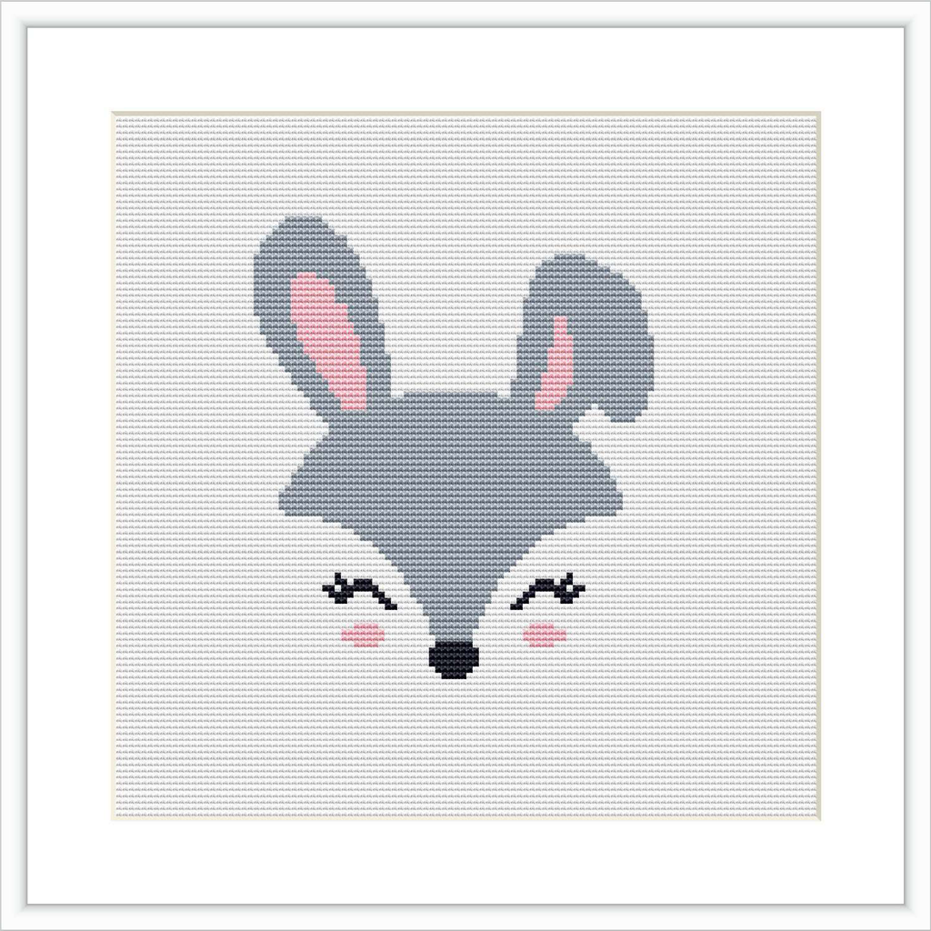 The image displays a cross stitch pattern featuring a stylized cartoon-like rabbit face with prominent ears and a playful expression. The pattern is centered on a evenly stitched canvas, bordered by a simple frame.