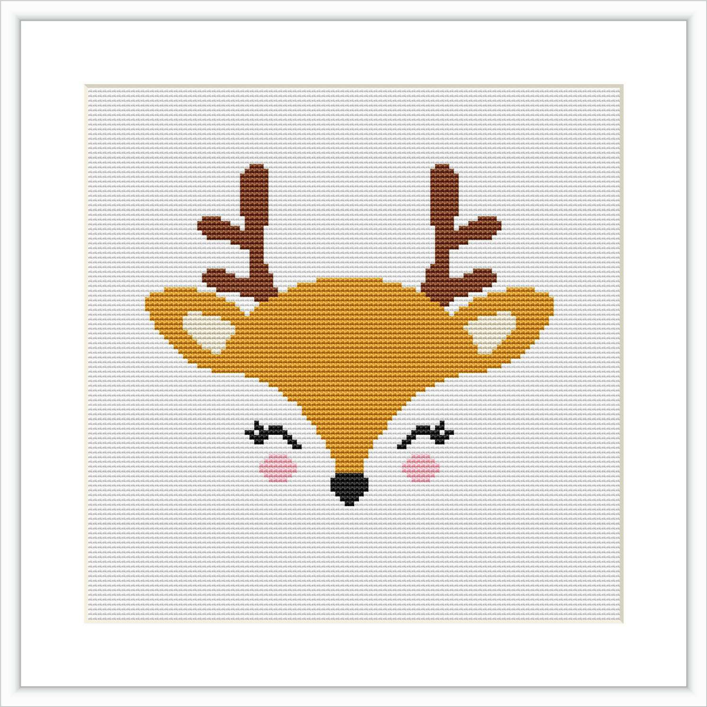 The image shows a framed cross stitch pattern of a stylized deer face with antlers. The background is white, and the deer is centered within the frame.