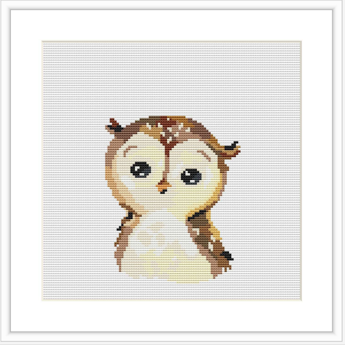 The image depicts a cross stitch pattern of a baby owl with big eyes and a small beak. It is centered on a grid-like fabric, with a clean, white border around the stitched area.