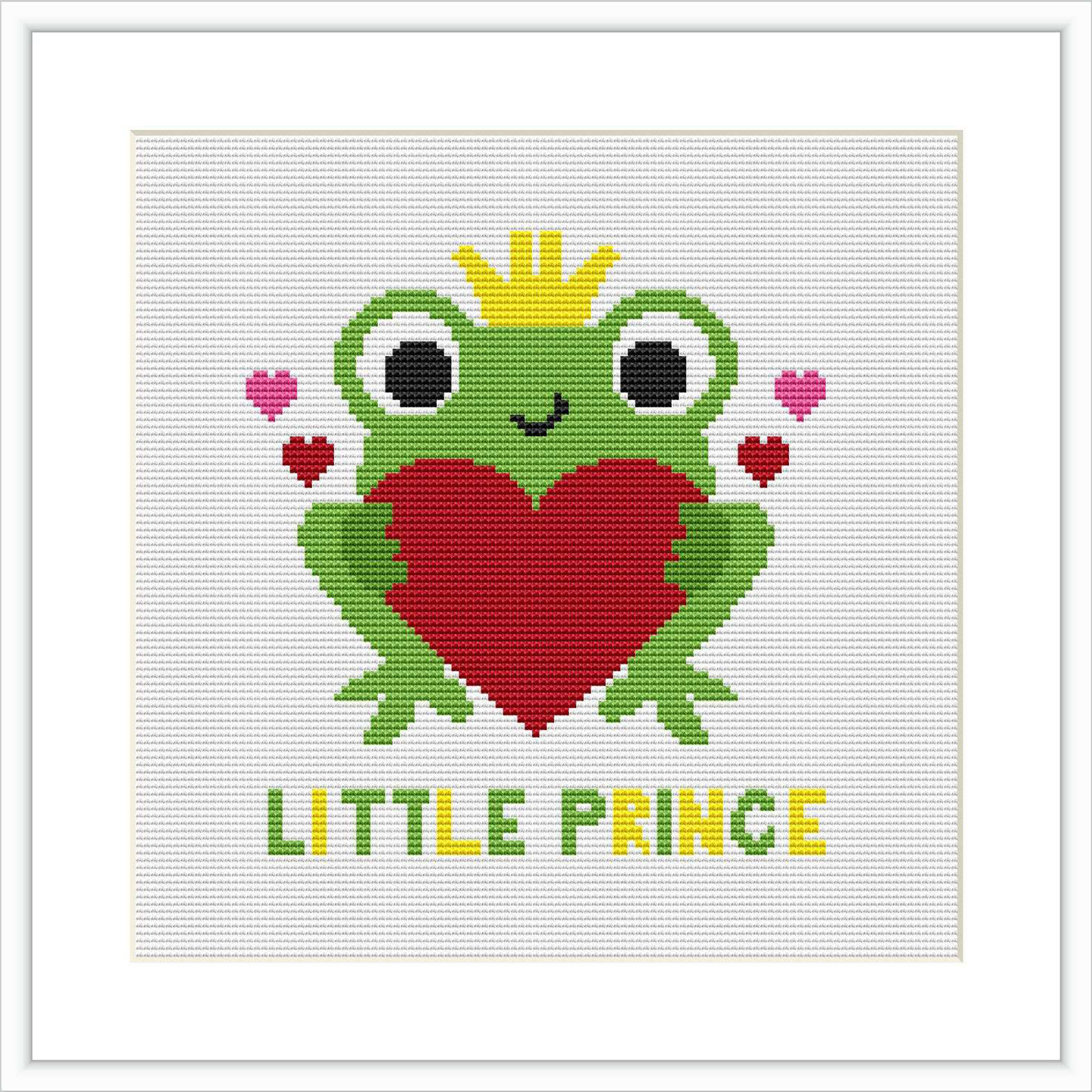 A cross stitch pattern depicting a stylized green frog wearing a crown, holding a red heart, with pink hearts and the words 'LITTLE PRINCE' below it.