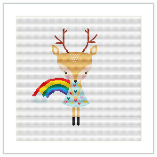 The image depicts a 140 by 140 stitch cross stitch pattern showing a stylized deer with a rainbow, decorative patterns on its body, and adorned antlers. The pattern is set against a white background and is 10.0 by 10.0 inches in size.