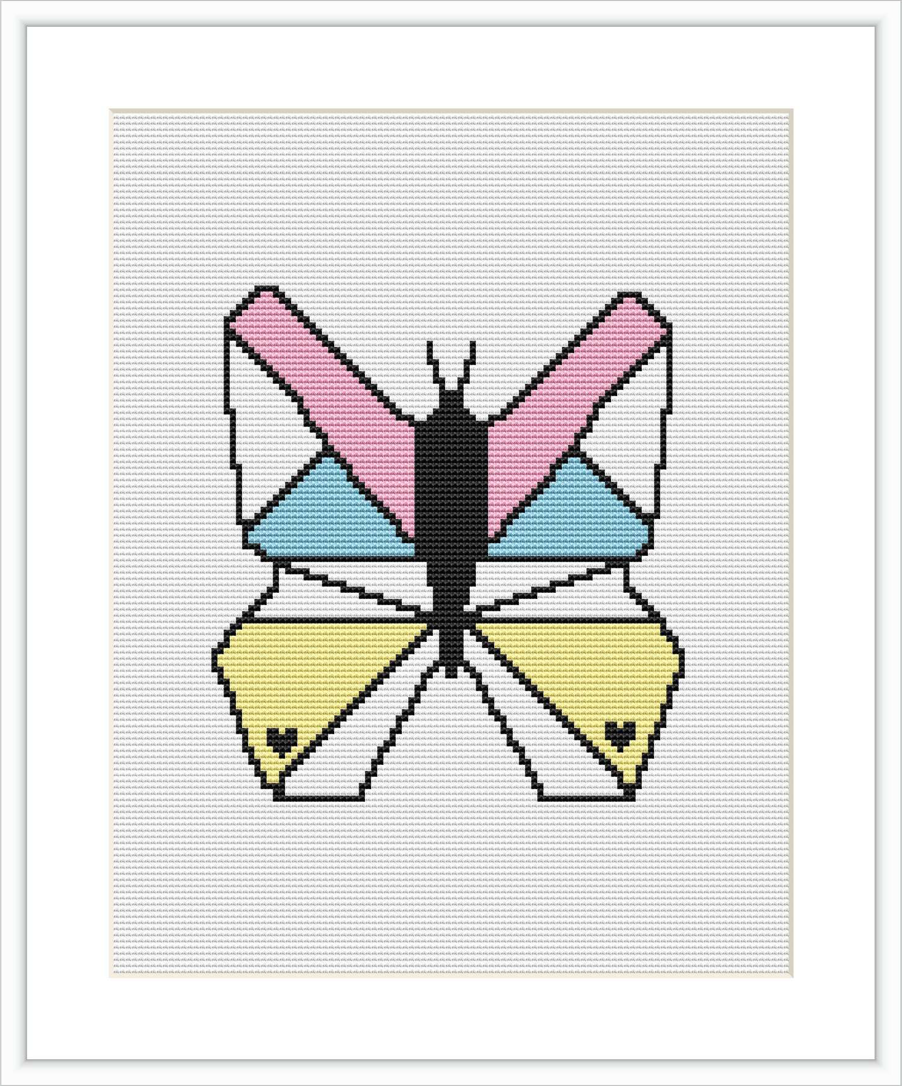 The image displays a cross-stitch pattern featuring a stylized butterfly with geometric patterns and distinct color blocks in shades of pink, blue, yellow, and black, centered on a white canvas.