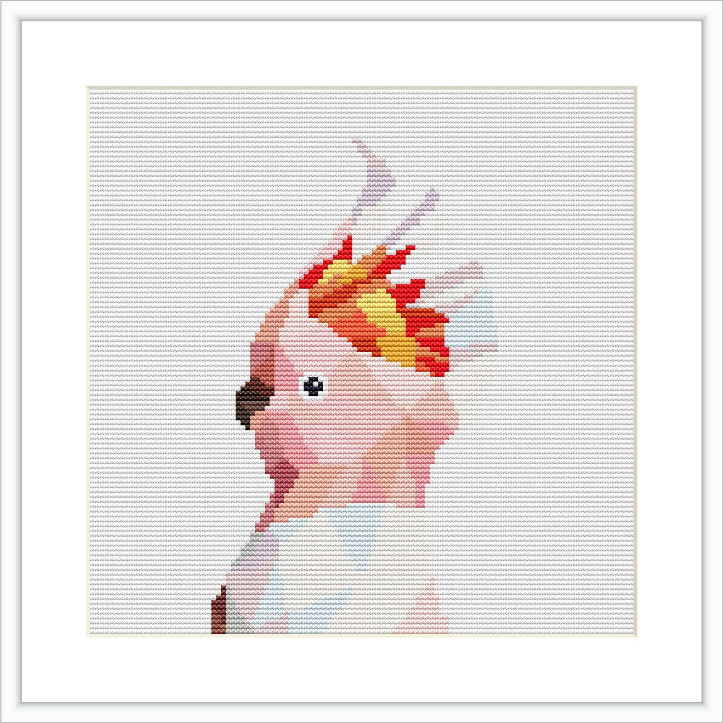 The image displays a framed cross-stitch design featuring a close-up of a cockatoo's profile with its distinctive pink crest highlighted against a simple white background.