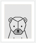 A cross stitch pattern depicting a stylized geometric polar bear centered within a rectangluar frame.