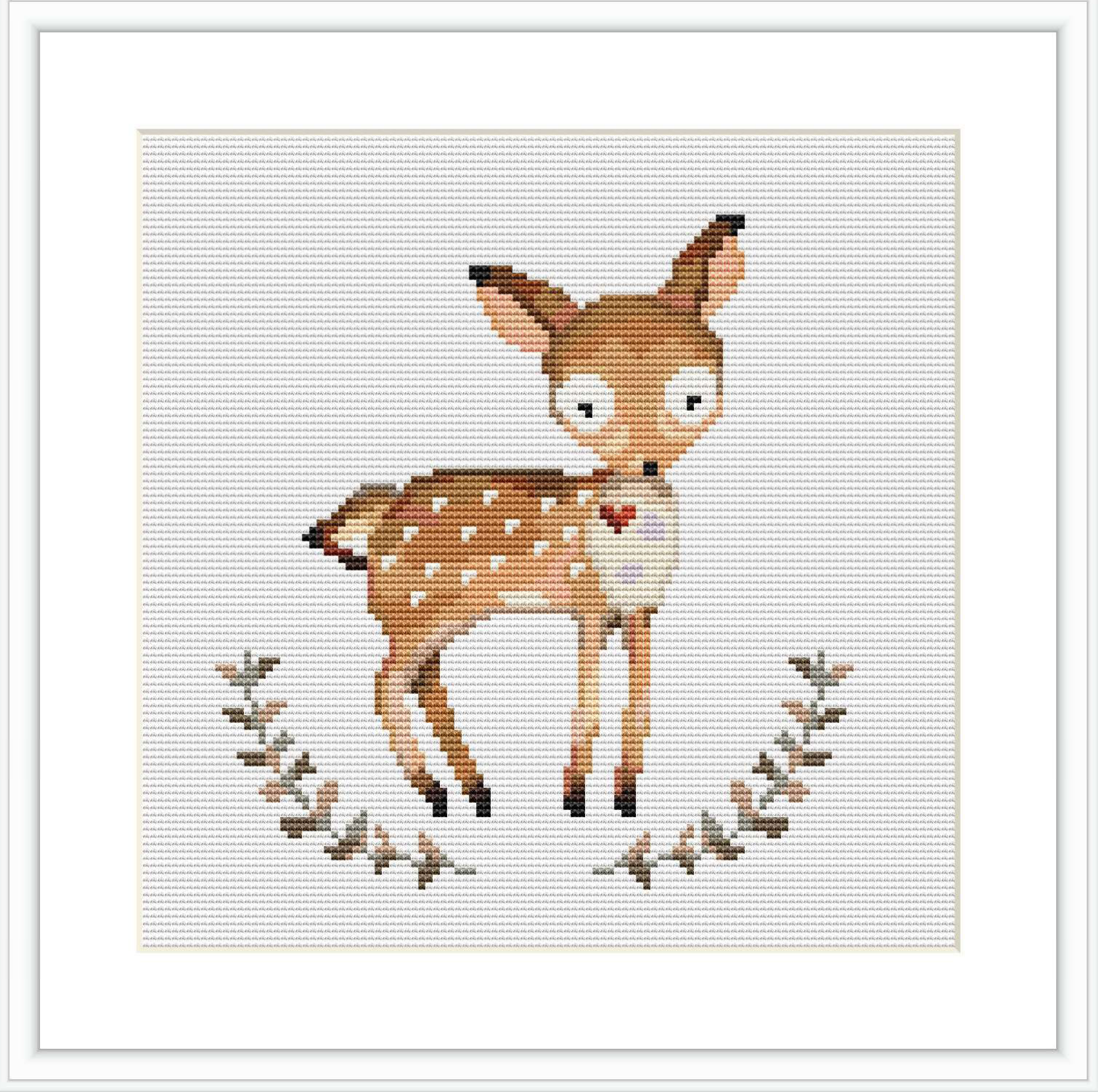 The image features a cross stitch pattern with a central figure of a deer surrounded by a circular wreath of leaves, all stitched onto a plain white background.