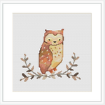 The image displays a cross-stitch pattern of an owl perched on a branch with leaves. The owl has shades of brown, rust, and cream, resembling autumn leaves. The background is plain, emphasizing the owl and branch motif.