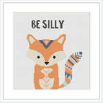 The image depicts a cross stitch pattern featuring a stylized fox with a striped tail and a super hero-like mask sitting below the words 'BE SILLY'. The fox is centered on a white background with small colored stitches.