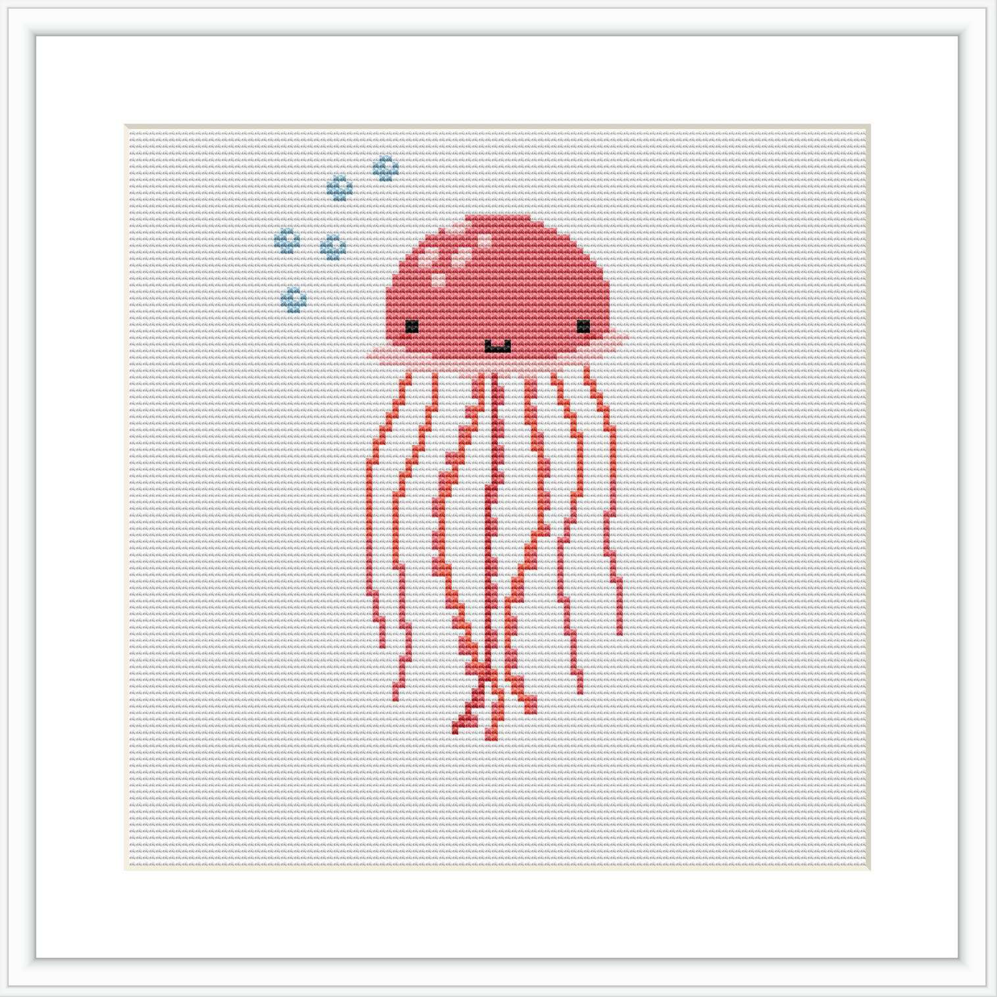 The image shows a stylized cross stitch pattern of a coral pink jellyfish with dangling tentacles and a pair of cute, simple eyes. Above the jellyfish, there are small blue bubbles. All elements are against a plain white background.