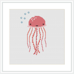 The image shows a stylized cross stitch pattern of a coral pink jellyfish with dangling tentacles and a pair of cute, simple eyes. Above the jellyfish, there are small blue bubbles. All elements are against a plain white background.