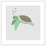 The image shows a cross stitch pattern of a sea turtle centered in the composition, with its fins outstretched. Surrounding the turtle are small blue stitches representing bubbles against a light background, simulating a serene underwater scene.