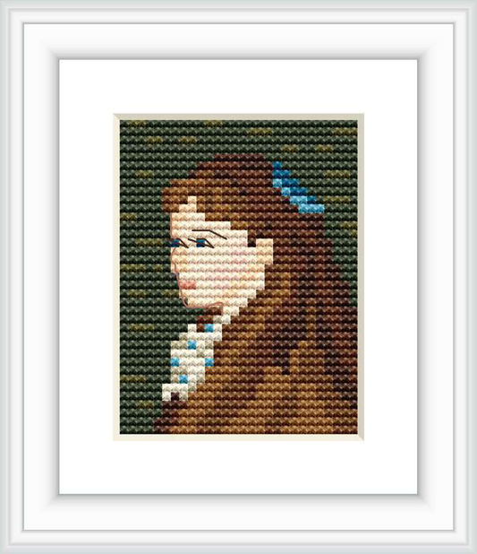 The image depicts a partial cross stitch portrait of a young girl, reminiscent of Mademoiselle Irene Cahen dAnvers by Renoir. The portrait is centered on the canvas, surrounded by a dark green background within a white frame.