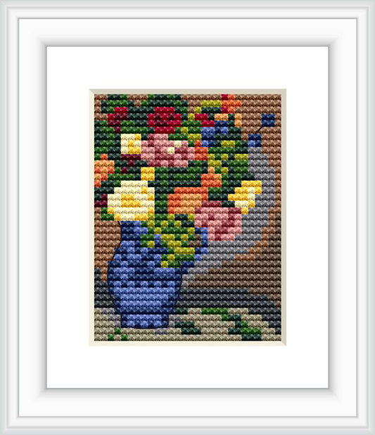 The image depicts a cross stitch pattern representing a vase filled with colorful flowers against a neutral background.