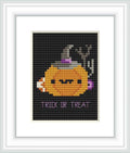 The image displays a cross stitch pattern with a stylized pumpkin ghost wearing a witch's hat against a black background, with the caption 'TRICK OR TREAT' at the bottom.