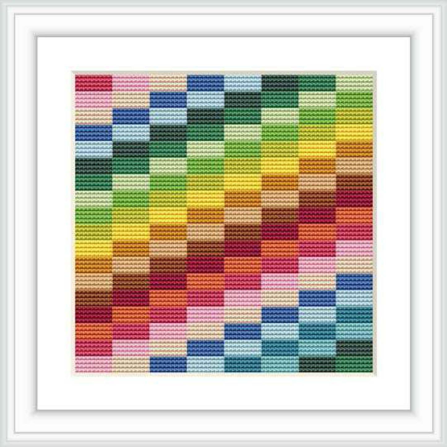 Framed cross stitch pattern displayed as a square grid with multiple brightly colored blocks in a striped rainbow pattern.