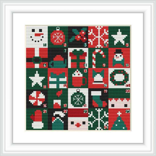 The image depicts a framed Christmas-themed cross stitch advent calendar composed of 24 squares, each with a different festive motif such as a snowman, ornaments, a snowflake, and presents. Numbers mark the squares corresponding to the days of December up to Christmas Eve.