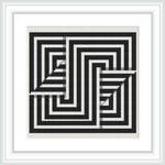 The image displays a framed cross stitch pattern with a geometric design. The pattern consists of black and white lines forming a complex maze-like optical illusion. It is set against a simple, solid-color background and encased within a white, square frame on a wall.