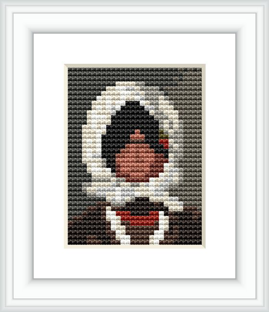 The image displays a framed cross stitch pattern featuring the bust of a peasant girl wearing a traditional white headscarf with dark clothing, set against a dark background.