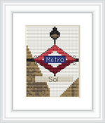 This is a cross stitch pattern of the iconic Madrid Metro sign for Sol station. The central element is a diamond-shaped sign with a red background and the word 'Metro' in white letters. Above and below the diamond are the signs for 'Sol', indicating the station name. The surroundings are stitched in beige tones to represent the architecture of the station.