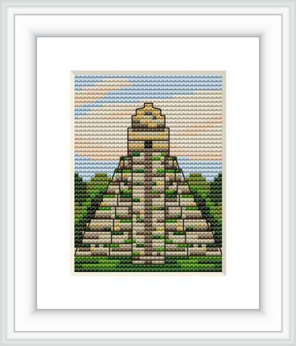 The image shows a cross-stitch pattern framed in white, featuring a detailed depiction of a Mayan pyramid set against a backdrop of a clear blue sky with hints of orange, representing either sunrise or sunset.